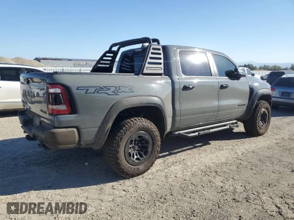 2023 Ram 1500 TRX z VIN 1C6SRFU97PN660101, wystawiony jako Copart lot #81612095 z przebiegiem 47 174 mil mil oraz Szkoda całkowita • Salvage title. Historia ofert i sprzedaży dostępna na DreamBid. Obrazek 3.