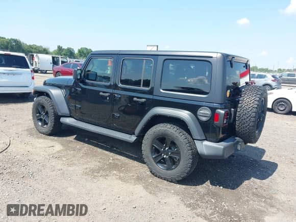2021 Jeep Wrangler Unlimited Willys z VIN 1C4HJXDN4MW859738, wystawiony jako IAAI lot #42593210 z przebiegiem 23 163 mil mil oraz . Historia ofert i sprzedaży dostępna na DreamBid. Obrazek 3.