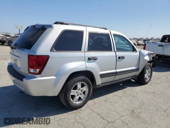 2006 Jeep Grand Cherokee Laredo z VIN 1J4GS48K56C148880, wystawiony jako Copart lot #68946415 z przebiegiem 161 713 mil mil oraz Szkoda całkowita • Salvage title. Historia ofert i sprzedaży dostępna na DreamBid. Obrazek 3.