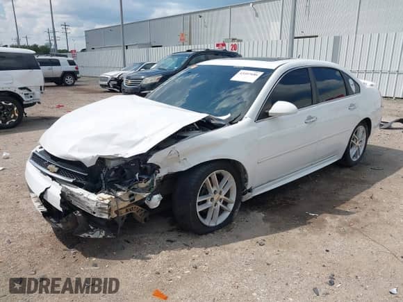 2012 Chevrolet Impala LTZ with VIN 2G1WC5E30C1138334, listed as a IAAI auction lot 43107686 with 193,149 mi miles and . Bid and sale history available at DreamBid. Image 19.