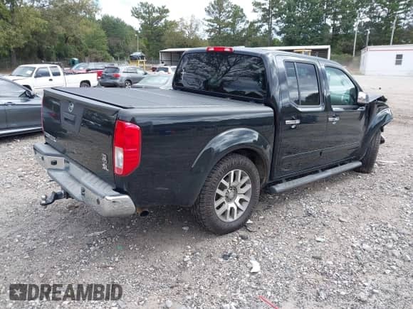 2013 Nissan Frontier SV with VIN 1N6AD0ER5DN728001, listed as a IAAI auction lot 43333484 with 140,612 mi miles and . Bid and sale history available at DreamBid. Image 4.