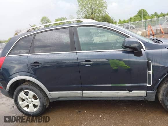 2014 Chevrolet Captiva Sport LS z VIN 3GNAL2EK4ES626739, wystawiony jako IAAI lot #42160552 z przebiegiem 89 584 mil mil oraz . Historia ofert i sprzedaży dostępna na DreamBid. Obrazek 14.