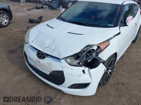 2014 Hyundai Veloster z VIN KMHTC6AD0EU204382, wystawiony jako IAAI lot #40287015 z przebiegiem 110 460 mil mil oraz . Historia ofert i sprzedaży dostępna na DreamBid. Obrazek 6.