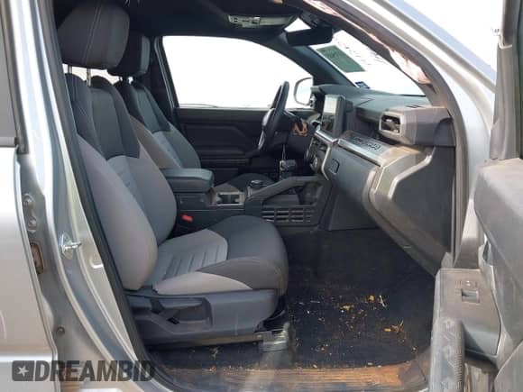 2024 Toyota Tacoma SR5 with VIN 3TYLB5JN0RT037837, listed as a IAAI auction lot 41315485 with 14,471 mi miles and . Bid and sale history available at DreamBid. Image 5.