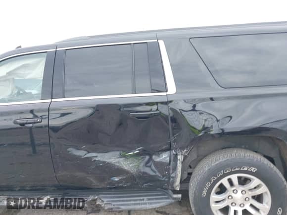 2020 Chevrolet Suburban LT with VIN 1GNSKHKC9LR103062, listed as a IAAI auction lot 42478008 with 229,786 mi miles and . Bid and sale history available at DreamBid. Image 14.