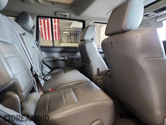 2006 Jeep Commander with VIN 1J8HH48N96C253790, listed as a Copart auction lot 64652495 with 158,803 mi miles and Salvage title. Bid and sale history available at DreamBid. Image 11.