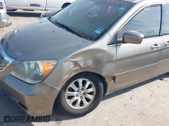 2009 Honda Odyssey EX with VIN 5FNRL38429B050727, listed as a IAAI auction lot 43100771 with 158,636 mi miles and . Bid and sale history available at DreamBid. Image 6.