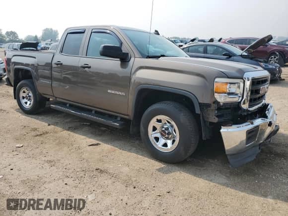 2015 GMC Sierra 1500 with VIN 1GTV2TEC8FZ242432, listed as a Copart auction lot 66849875 with 63,268 mi miles and Salvage title. Bid and sale history available at DreamBid. Image 4.