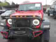 2020 Jeep Wrangler Sport S with VIN 1C4GJXAG8LW266464, listed as a IAAI auction lot 41958375 with 57,139 mi miles and . Bid and sale history available at DreamBid. Image 6.