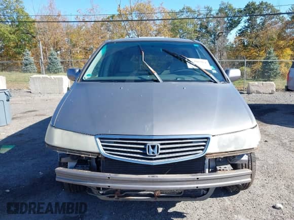 2000 Honda Odyssey EX with VIN 2HKRL1868YH542409, listed as a IAAI auction lot 43406964 with 215,253 mi miles and . Bid and sale history available at DreamBid. Image 6.