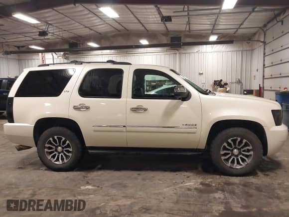 2012 Chevrolet Tahoe LTZ с VIN 1GNSKCE07CR227674, выставлен на аукционе IAAI как лот 42166732 с пробегом 204 171 миль миль и . История ставок и продаж доступна на DreamBid. Изображение 13.