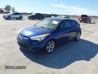 2015 Hyundai Veloster with VIN KMHTC6AD2FU241533, listed as a IAAI auction lot 43447479 with 123,219 mi miles and . Bid and sale history available at DreamBid. Image 2.