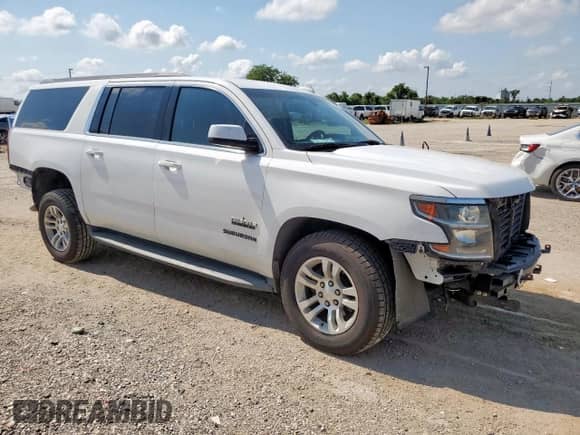 2019 Chevrolet Suburban LS z VIN 1GNSCGKC6KR210298, wystawiony jako Copart lot #67282405 z przebiegiem 104 939 mil mil oraz Szkoda całkowita • Salvage title. Historia ofert i sprzedaży dostępna na DreamBid. Obrazek 4.