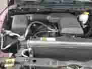 2018 Ram 1500 Big Horn z VIN 1C6RR6LG7JS245335, wystawiony jako Copart lot #61217115 z przebiegiem 134 442 mil mil oraz Szkoda całkowita • Salvage title. Historia ofert i sprzedaży dostępna na DreamBid. Obrazek 14.