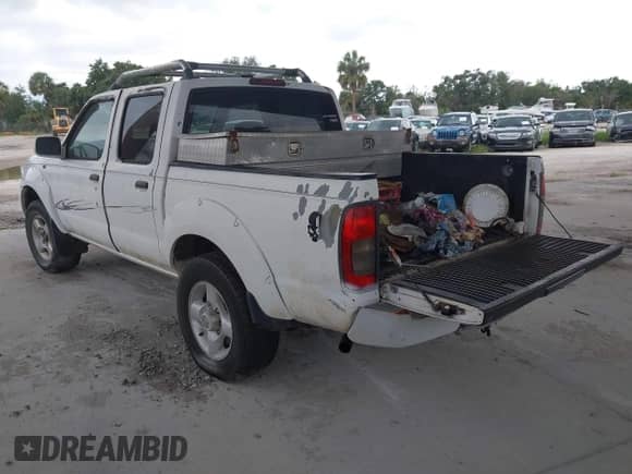 2001 Nissan Frontier SE with VIN 1N6ED27T61C324671, listed as a IAAI auction lot 42403537 with 190,638 mi miles and . Bid and sale history available at DreamBid. Image 3.