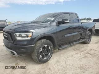 2020 Ram 1500 Rebel with VIN 1C6SRFET5LN141519, listed as a Copart auction lot 86128604 with 49,157 mi miles and Salvage title. Bid and sale history available at DreamBid. Image 1.