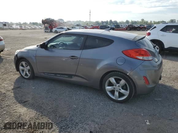 2012 Hyundai Veloster w/Black Int z VIN KMHTC6AD1CU081088, wystawiony jako Copart lot #71685565 z przebiegiem Nie podano mil oraz Szkoda całkowita • Salvage title. Historia ofert i sprzedaży dostępna na DreamBid. Obrazek 2.