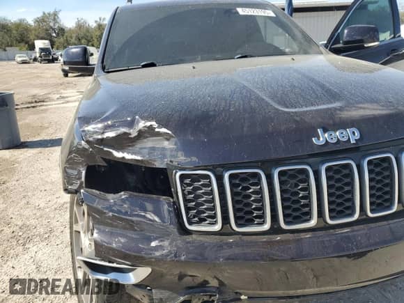 2018 Jeep Grand Cherokee Sterling with VIN 1C4RJEBG4JC304749, listed as a Copart auction lot 45123195 with 69,137 mi miles and Salvage title. Bid and sale history available at DreamBid. Image 12.