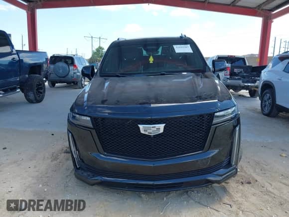 2021 Cadillac Escalade Sport z VIN 1GYS3FKL3MR216155, wystawiony jako IAAI lot #42049587 z przebiegiem 84 000 mil mil oraz . Historia ofert i sprzedaży dostępna na DreamBid. Obrazek 12.