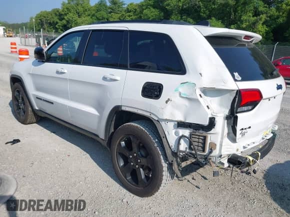 2019 Jeep Grand Cherokee Altitude with VIN 1C4RJFAG1KC829339, listed as a IAAI auction lot 42426285 with 86,404 mi miles and . Bid and sale history available at DreamBid. Image 3.