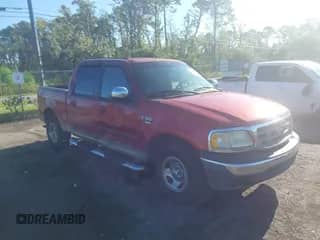 2002 Ford F-150 XLT с VIN 1FTRW07LX2KD47266, выставлен на аукционе IAAI как лот 42823107 с пробегом 183 796 миль миль и . История ставок и продаж доступна на DreamBid. Изображение 1.