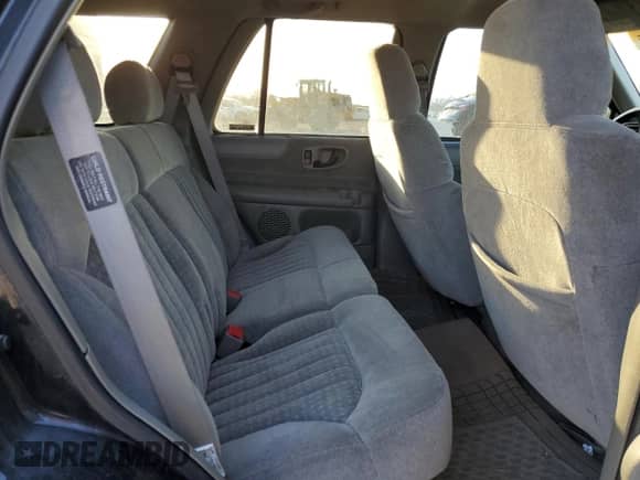 1999 Chevrolet Blazer LS z VIN 1GNCS13W7X2131753, wystawiony jako Copart lot #46428975 z przebiegiem 161 307 mil mil oraz Szkoda całkowita • Salvage title. Historia ofert i sprzedaży dostępna na DreamBid. Obrazek 11.