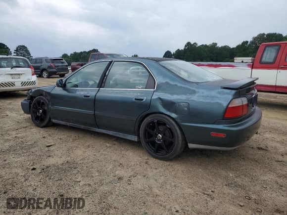 1996 Honda Accord LX z VIN 1HGCD5638TA224441, wystawiony jako Copart lot #57656165 z przebiegiem 163 637 mil mil oraz Szkoda całkowita • Salvage title. Historia ofert i sprzedaży dostępna na DreamBid. Obrazek 2.