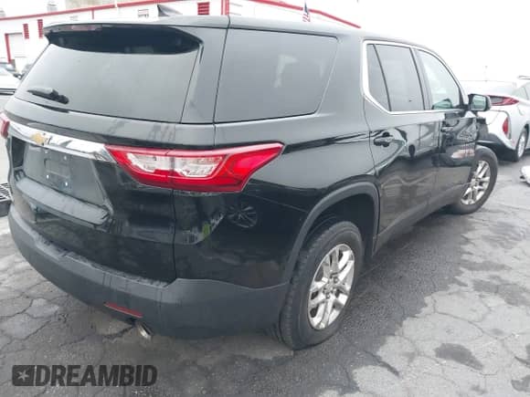 2019 Chevrolet Traverse LS with VIN 1GNERFKW2KJ300210, listed as a IAAI auction lot 43309517 with 59,179 mi miles and . Bid and sale history available at DreamBid. Image 4.