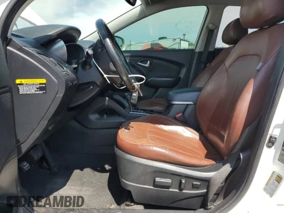 2011 Hyundai Tucson Limited z VIN KM8JU3AC1BU229913, wystawiony jako Copart lot #59896855 z przebiegiem 117 445 mil mil oraz Szkoda całkowita • Salvage title. Historia ofert i sprzedaży dostępna na DreamBid. Obrazek 7.