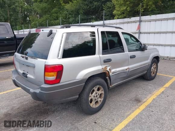 2002 Jeep Grand Cherokee с VIN 1J4GX38S92C237261, выставлен на аукционе IAAI как лот 42923904 с пробегом 112 640 миль миль и . История ставок и продаж доступна на DreamBid. Изображение 4.