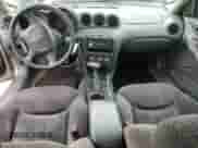 2001 Pontiac Grand Am SE1 с VIN 1G2NF52T21M607203, выставлен на аукционе Copart как лот 57080645 с пробегом 209 896 миль миль и Списание • Salvage title. История ставок и продаж доступна на DreamBid. Изображение 8.
