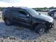 2016 Jeep Grand Cherokee Laredo with VIN 1C4RJEAG8GC457919, listed as a Copart auction lot 64068415 with 139,074 mi miles and Salvage title. Bid and sale history available at DreamBid. Image 4.