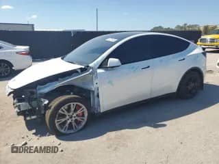 2022 Tesla Model Y Long Range с VIN 7SAYGDEE5NF437823, выставлен на аукционе Copart как лот 80781935 с пробегом 28 139 миль миль и Списание • Salvage title. История ставок и продаж доступна на DreamBid. Изображение 1.