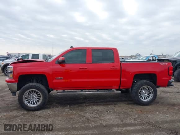 2014 Chevrolet Silverado 1500 LT with VIN 3GCUKREC7EG427441, listed as a IAAI auction lot 41576731 with 145,127 mi miles and . Bid and sale history available at DreamBid. Image 14.