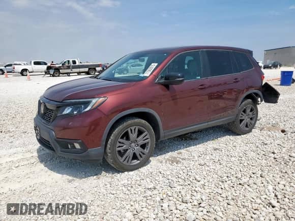 2020 Honda Passport EX-L with VIN 5FNYF8H57LB014709, listed as a Copart auction lot 71562815 with 73,522 mi miles and Salvage title. Bid and sale history available at DreamBid. Image 1.