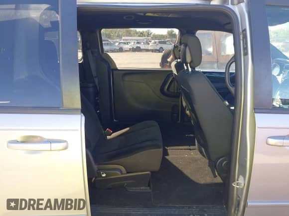 2017 Dodge Grand Caravan SE Plus with VIN 2C4RDGBG1HR856021, listed as a IAAI auction lot 43497683 with 169,647 mi miles and . Bid and sale history available at DreamBid. Image 8.