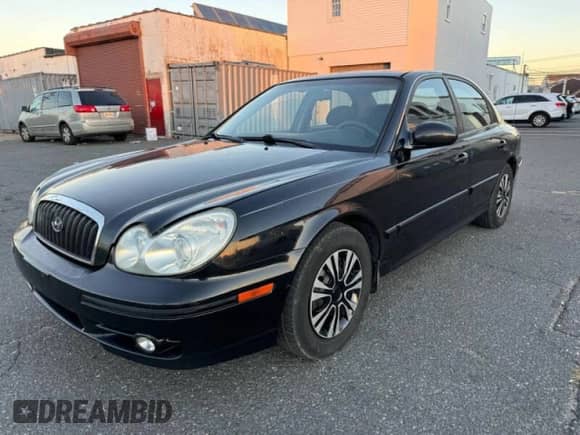 2004 Hyundai Sonata z VIN KMHWF25H94A000139, wystawiony jako Copart lot #42974655 z przebiegiem 129 267 mil mil oraz Czysty tytuł • Clean title. Historia ofert i sprzedaży dostępna na DreamBid. Obrazek 2.