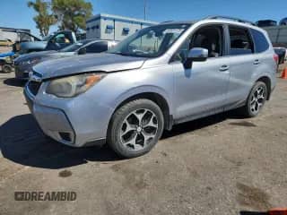 2014 Subaru Forester XT Touring z VIN JF2SJGPCXEH536396, wystawiony jako Copart lot #80501175 z przebiegiem 141 931 mil mil oraz Szkoda całkowita • Salvage title. Historia ofert i sprzedaży dostępna na DreamBid. Obrazek 1.