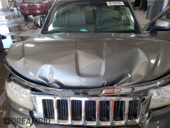 2012 Jeep Grand Cherokee Laredo z VIN 1C4RJFAG8CC158060, wystawiony jako Copart lot #86788295 z przebiegiem 132 937 mil mil oraz Szkoda całkowita • Salvage title. Historia ofert i sprzedaży dostępna na DreamBid. Obrazek 12.