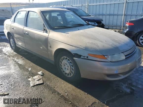 2001 Saturn LS с VIN 1G8JU52FX1Y552416, выставлен на аукционе Copart как лот 41967165 с пробегом 196 403 миль миль и Списание • Salvage title. История ставок и продаж доступна на DreamBid. Изображение 4.