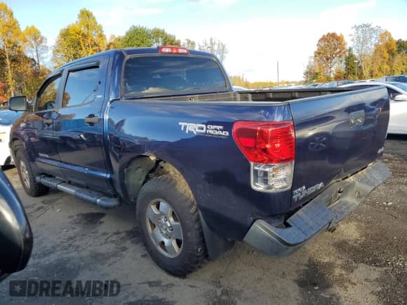 2013 Toyota Tundra with VIN 5TFDY5F17DX283422, listed as a Copart auction lot 82744775 with 216,601 mi miles and Salvage title. Bid and sale history available at DreamBid. Image 2.