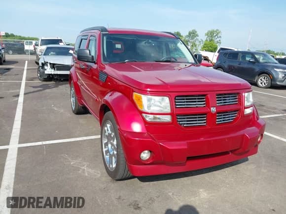 2008 Dodge Nitro R/T with VIN 1D8GU58678W102267, listed as a IAAI auction lot 42620907 with 186,937 mi miles and . Bid and sale history available at DreamBid. Image 1.