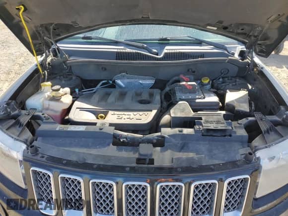 2014 Jeep Compass Latitude с VIN 1C4NJDEB7ED632935, выставлен на аукционе Copart как лот 68498975 с пробегом 70 222 миль миль и Списание • Salvage title. История ставок и продаж доступна на DreamBid. Изображение 12.