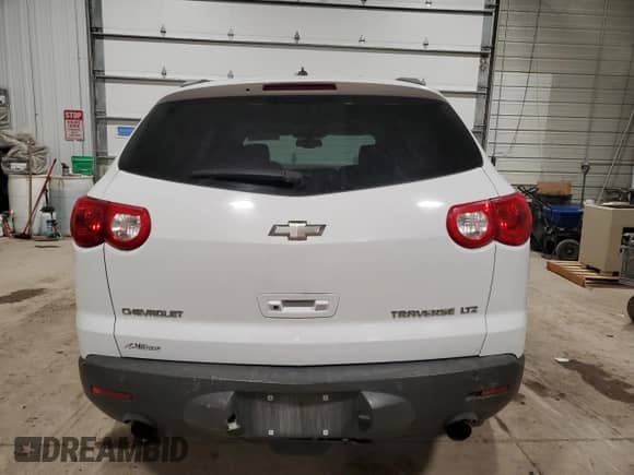 2009 Chevrolet Traverse LTZ with VIN 1GNEV33DX9S109405, listed as a Copart auction lot 84561344 with 171,791 mi miles and Salvage title. Bid and sale history available at DreamBid. Image 6.