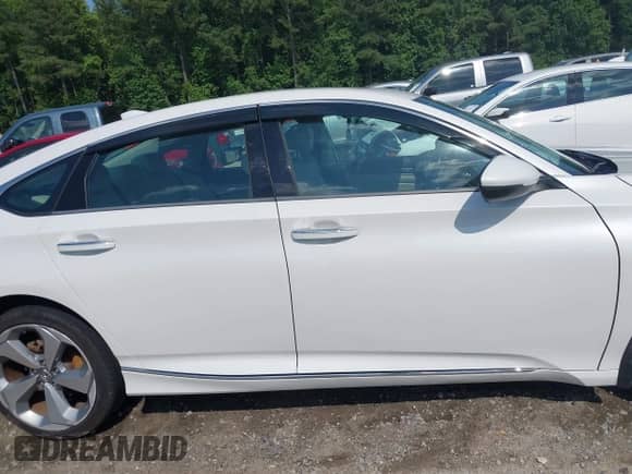 2019 Honda Accord Touring with VIN 1HGCV2F94KA017625, listed as a IAAI auction lot 42524351 with Not provided miles and . Bid and sale history available at DreamBid. Image 12.
