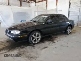 1996 Pontiac Grand Am SE z VIN 1G2NE52T8TC744741, wystawiony jako Copart lot #53675115 z przebiegiem 43 768 mil mil oraz Czysty tytuł • Clean title. Historia ofert i sprzedaży dostępna na DreamBid. Obrazek 1.