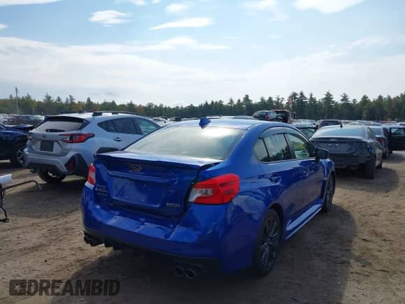 2018 Subaru WRX with VIN JF1VA1A65J9815972, listed as a IAAI auction lot 43264947 with 107,333 mi miles and . Bid and sale history available at DreamBid. Image 4.