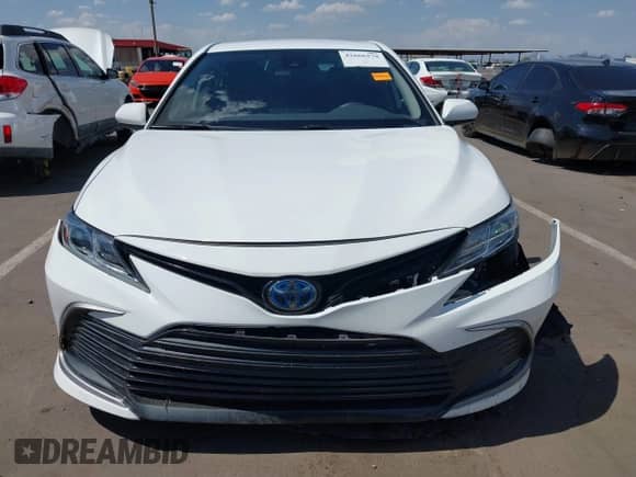 2022 Toyota Camry Hybrid LE with VIN 4T1C31AK8NU594181, listed as a IAAI auction lot 42666278 with 35,921 mi miles and . Bid and sale history available at DreamBid. Image 12.