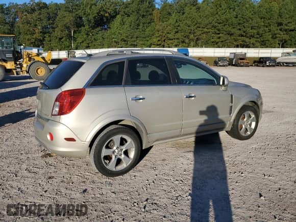 2014 Chevrolet Captiva Sport LT with VIN 3GNAL3EK5ES652837, listed as a Copart auction lot 76476324 with 142,678 mi miles and Clean title. Bid and sale history available at DreamBid. Image 3.