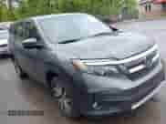 2022 Honda Pilot EX-L z VIN 5FNYF5H55NB006660, wystawiony jako IAAI lot #42240607 z przebiegiem 55 632 mil mil oraz . Historia ofert i sprzedaży dostępna na DreamBid. Obrazek 1.